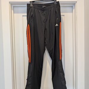Adidas Black Track Pants with Orange Stripes